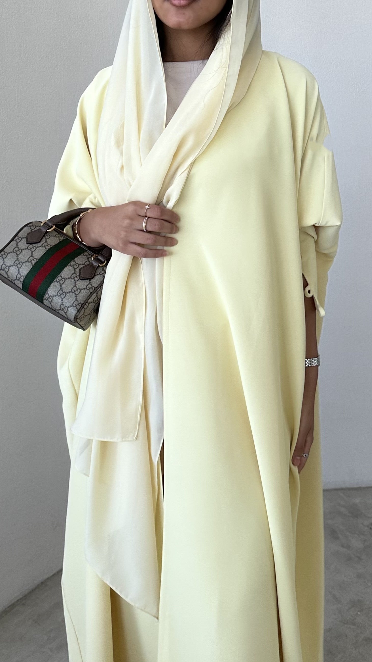 Yellow crepe abaya, bisht style with Pearl Buttons