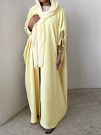 Yellow crepe abaya, bisht style with Pearl Buttons