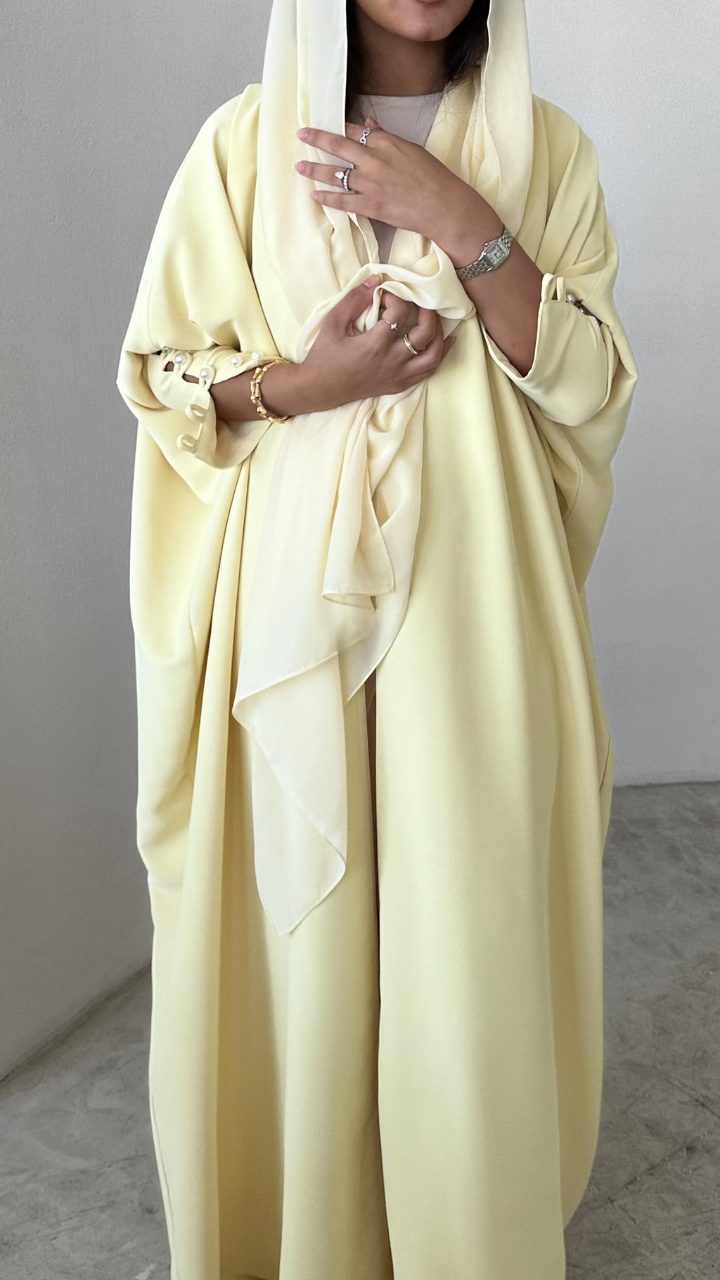Yellow crepe abaya, bisht style with Pearl Buttons