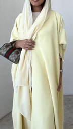 Yellow crepe abaya, bisht style with Pearl Buttons