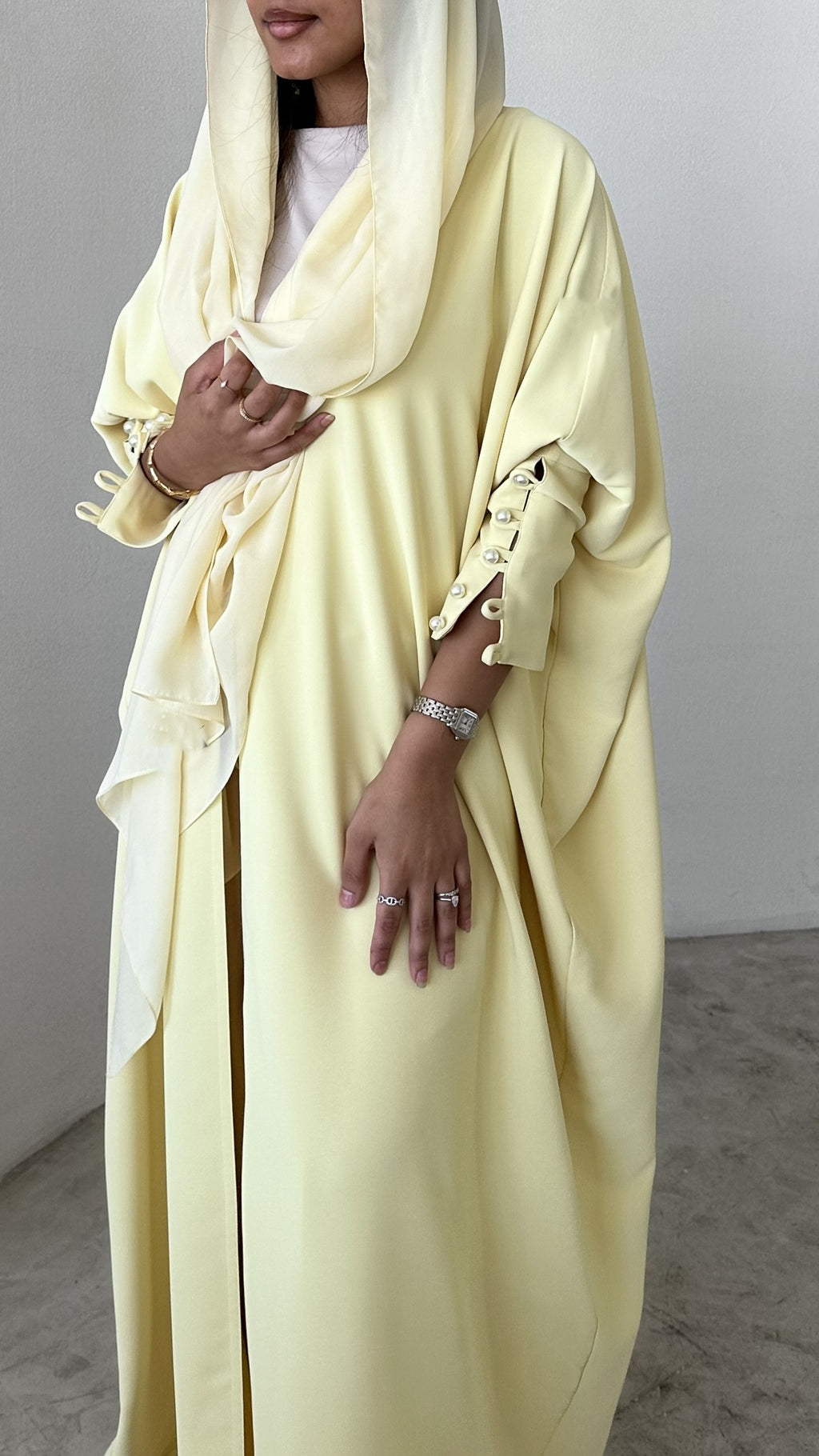 Yellow crepe abaya, bisht style with Pearl Buttons