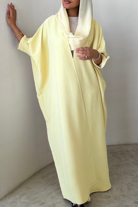 Yellow crepe abaya, bisht style with Pearl Buttons