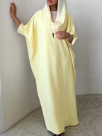 Yellow crepe abaya, bisht style with Pearl Buttons